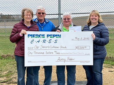 Audrey Severson, Clair Severson and Donna Constant receive check